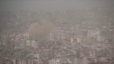 Israel strikes Beirut's southern suburbs sending plume of smoke into sky
