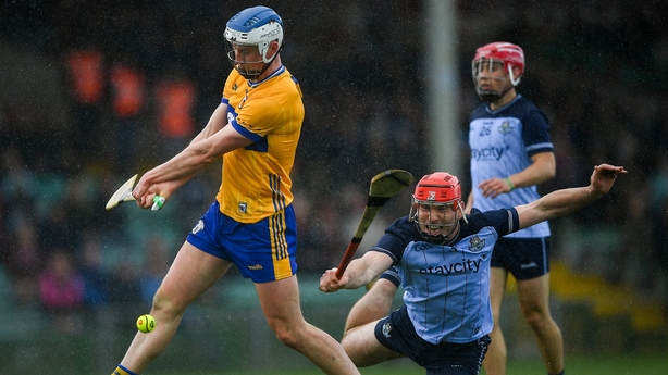 Diarmuid Ryan of Clare in action against Paddy Smyth - 2026 Allianz HL Division 1B final