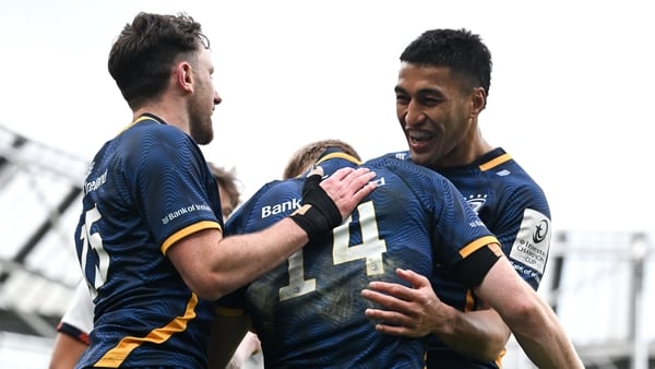 5 April 2026; Tommy O'Brien of Leinster celebrates with teamates Hugo Keenan and Rieko Ioane after scoring his side's second try during the Investec Champions Cup match between Leinster and Edinburgh at the Aviva Stadium in Dublin. Photo by Brendan Moran/