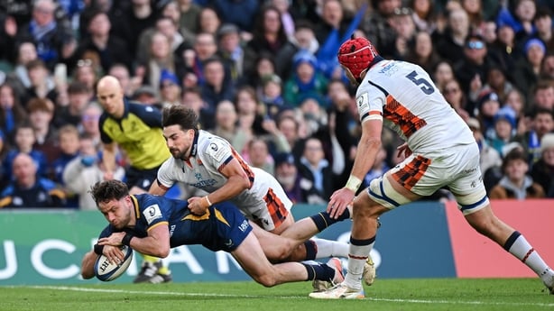 5 April 2026; Hugo Keenan of Leinster dives over to score his side's fourth try during the Investec Champions Cup match between Leinster and Edinburgh at the Aviva Stadium in Dublin. Photo by Ramsey Cardy/Sportsfile