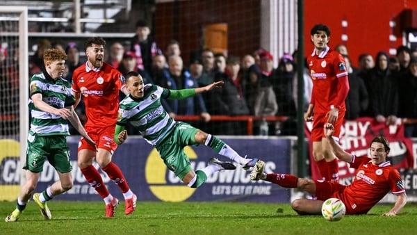 Graham Burke of Shamrock Rovers is tackled by Harry Wood of Shelbourne during the SSE Airtricity Men's Premier Division match between Shelbourne and Shamrock Rovers at Tolka Park in Dublin.