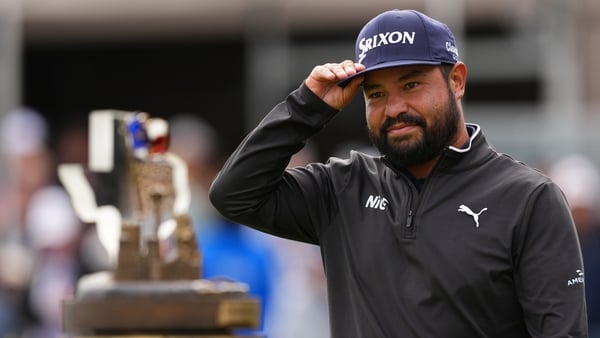 SAN ANTONIO, TEXAS - APRIL 05: J.J. Spaun of the United States looks at the trophy after winning the final round of the Valero Texas Open 2026 at TPC San Antonio on April 05, 2026 in San Antonio, Texas. (Photo by Dylan Buell/Getty Images)