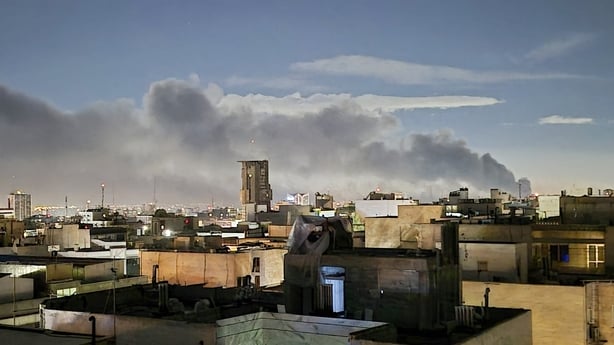 Smoke rises over residential areas 