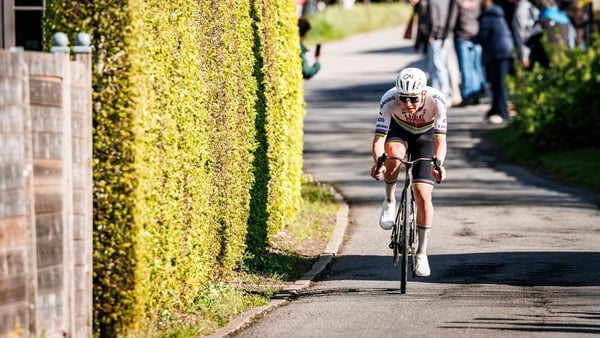 cyclist Tadej Pogacar seen competing in the tour of flanders