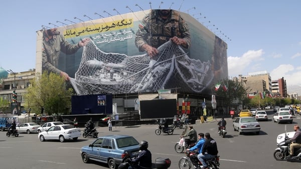 A general view of the giant banner hung Enghelab Square that reads, 'The Strait of Hormuz will remain closed; the entire Persian Gulf is our hunting ground.'