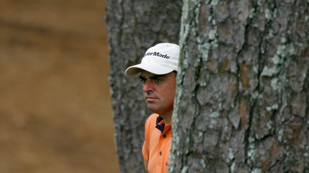 12 Apr 2002: Paul McGinley of Ireland in the tress on the 10th hole during the second day of the Masters Tournament from the Augusta National Golf Club, Augusta, Georgia. DIGITAL IMAGE. EDITORIAL USE ONLY Mandatory Credit: David Cannon/Getty Images