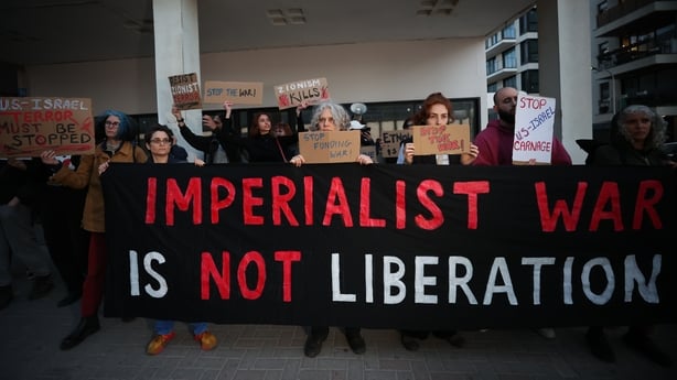 Dozens of Israeli demonstrators gather outside the US Embassy to protest US and Israeli attacks on Iran and Lebanon, calling for an end to the war in Tel Aviv, Israel on April 6, 2026. (Photo by Saeed Qaq/Anadolu via Getty Images)