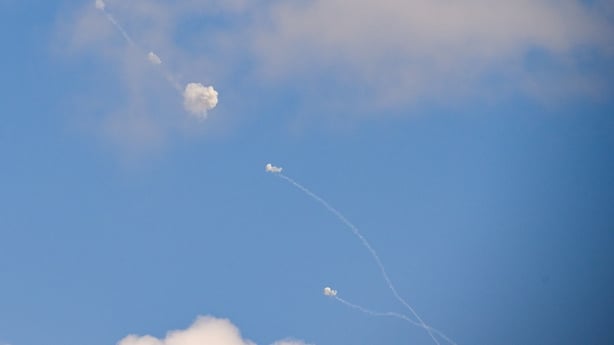 Smoke clouds form following rockets intercepting Iranian ballistic missile on April 06, 2026 in Tel Aviv, Israel. This was the fourth salvo of missile fire today. Iran has continued firing waves of drones and missiles at Israel after the United States and Israel launched a joint attack on Iran early