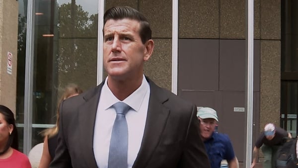 This video grab taken from AFPTV shows former member of Australia's elite Special Air Service regiment Ben Roberts-Smith leaving the Federal Court in Sydney