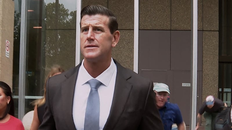 This video grab taken from AFPTV shows former member of Australia's elite Special Air Service regiment Ben Roberts-Smith leaving the Federal Court in Sydney