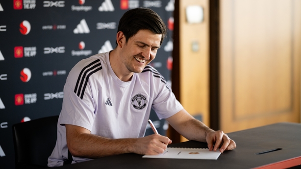 Harry Maguire of Manchester United poses after signing a contract extension with the club at Carrington Training Ground on April 07, 2026 in Manchester, England. 