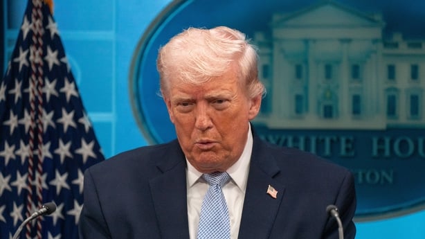 US President Donald Trump speaks to reporters in the White House