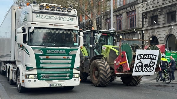 An HGV beside a convoy of tractors during a fuel protest in O'Connell Street