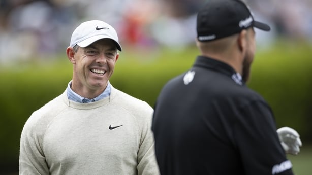 Masters champion Rory McIlroy of Northern Ireland, center, speaks with Shane Lowry of Ireland during a practice round prior to the Masters at Augusta National Golf Club, Monday, April 06, 2026.. (Photo by Kieran Cleeves/Augusta National/Getty Images)