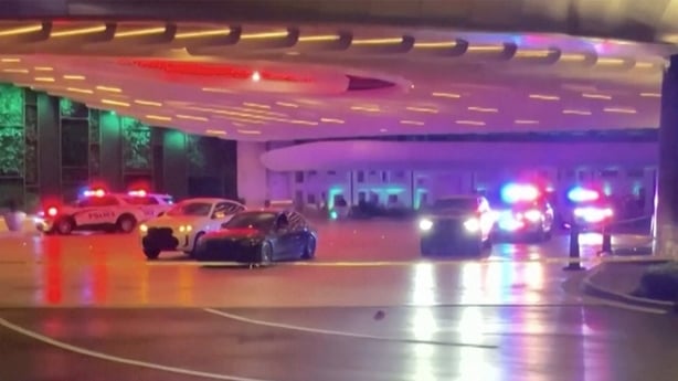 Police and emergency personnel respond to the scene of a shooting at a valet area outside of the Seminole Hard Rock in Hollywood