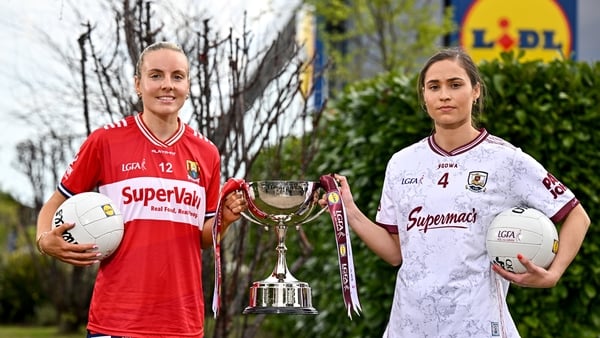 7 April 2026; Emma Cleary of Cork, left, and Kate Geraghty of Galway pictured with the Lidl National Football League Division 1 cup during the LGFA Lidl NFL Finals Captain’s Day at Lidl HQ in Tallaght, Dublin. Photo by Sam Barnes/Sportsfile