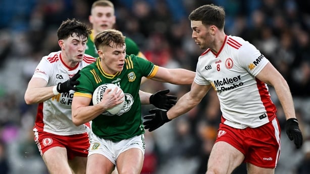 Ruairí Kinsella of Meath is tackled by Ciarán Daly, left, and Brian Kennedy of Tyrone during the Allianz Football League Division 2 match between Meath and Tyrone at Croke Park in Dublin.