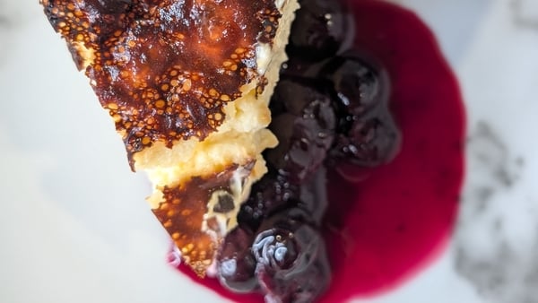 Eunice Power's burnt basque cheesecake with blueberry compote and cream