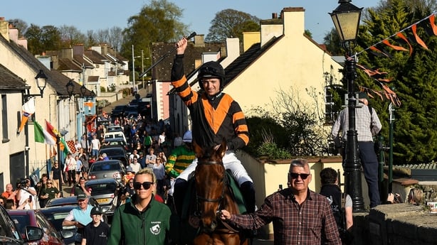 Patrick Mullins on Nick Rackett, centre, celebrates with, from left, groom Katie Walton and owner Stewart Andrew, as they are welcomed home to Carlow during homecoming celebrations at the Lord Bagenal Inn in Leighlinbridge following their Grand National win with the horse Nick Rockett.
