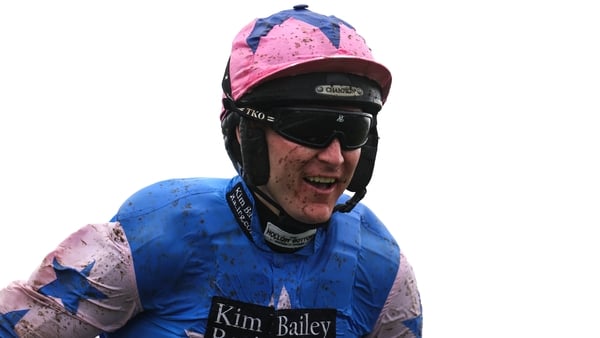 Jockey Tom Bellamy celebrates on White Noise after winning the Ryanair Mares' Novices' Hurdle on day three of the 2026 Cheltenham Racing Festival at Prestbury Park in Cheltenham, England.