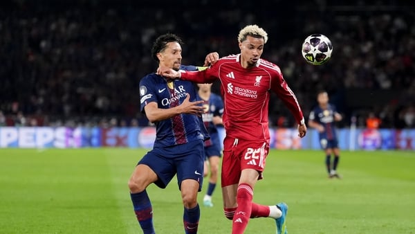 Paris Saint-Germain's Aoas Correa Marquinhos (left) and Liverpool's Hugo Ekitike