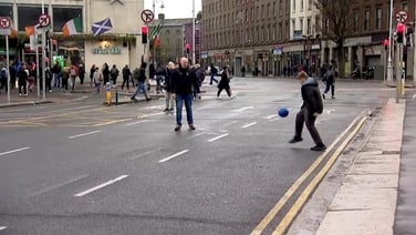 Donegal protestors play football on O’Connell Bridge