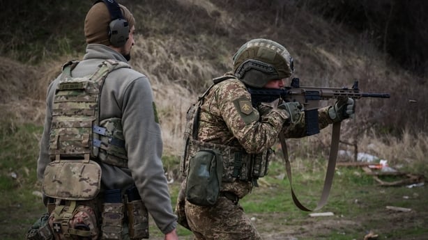 KHARKIV, UKRAINE - APRIL 9: Infantrymen of the 13th Operational Brigade of the National Guard of Ukraine 'Khartiia' practice tactical techniques of firing from cover at a training ground in Kharkiv region, Ukraine on April 9, 2026. (Photo by Stringer/Anadolu via Getty Images)