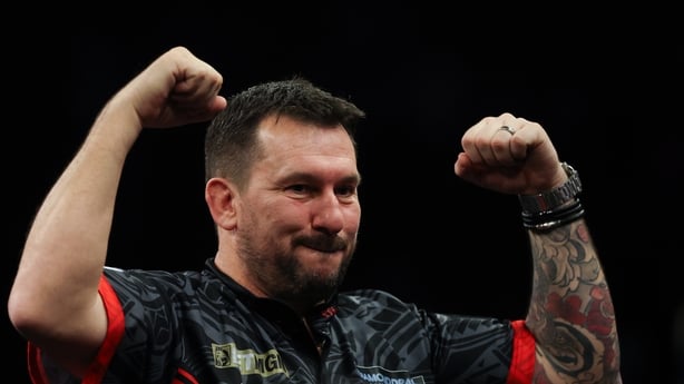 Jonny Clayton celebrates beating Michael van Gerwen in the final of the 2026 BetMGM Premier League Darts in Brighton