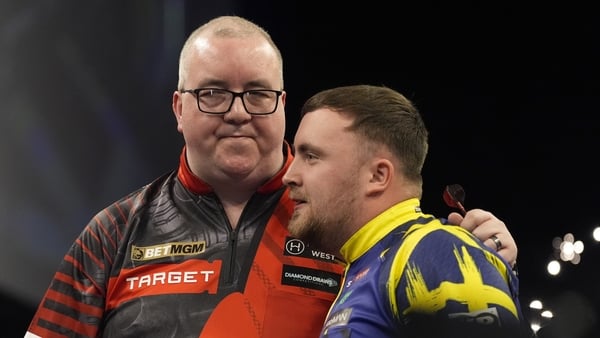 Steve Bunting consoles Luke Littler after beating him on night ten of the BetMGM Premier League 2026 in Brighton