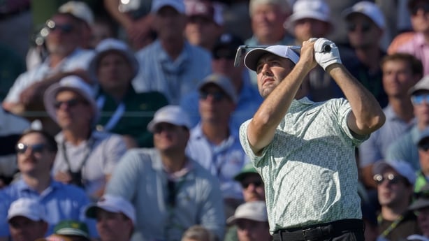Masters champion Scottie Scheffler of the United States plays a stroke from the No. 12 tee during the first round of the Masters at Augusta National Golf Club, Thursday, April 09, 2026. (Photo by Thomas Lovelock/Augusta National/Getty Images)