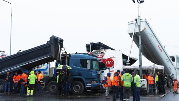 Protesters take part in a blockade at a fuel depot in Foynes, Co Limerick