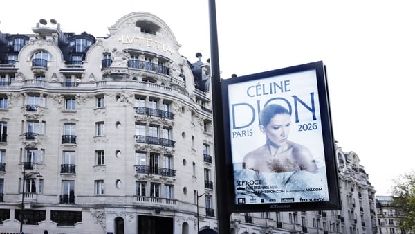 A poster announcing singer Celine Dion's Paris gigs