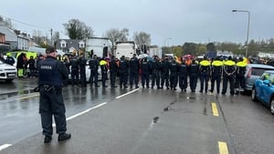 Protests at fuel depots and gridlock on the roads show image