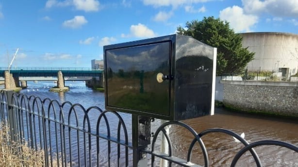 A black box (a hydro-data station) at the side of Dargle River