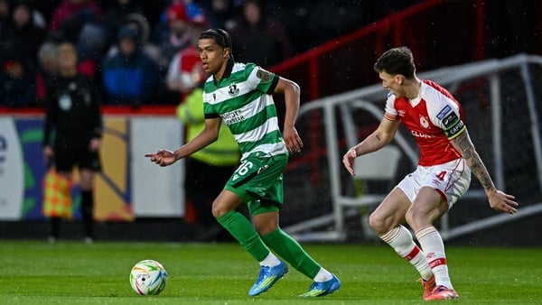 Victor Ozhianvuna of Shamrock Rovers in action against Joe Redmond of St Patrick's Athletic during the SSE Airtricity Men's Premier Division match between St Patrick's Athletic and Shamrock Rovers at Richmond Park in Dublin.