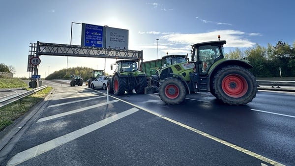 Tractors are pictured blocking the road on the N4 to M50 in Dublin due to the ongoing fuel protests