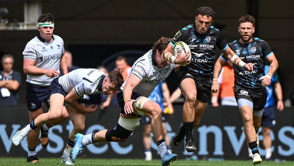 Tom Banks of Montpellier Hérault breaks away from Cian Prendergast of Connacht during the EPCR Challenge Cup quarter-final match between Montpellier and Connacht at Septeo Stadium in Montpellier