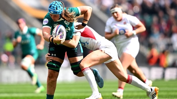 11 April 2026; Brittany Hogan of Ireland is tackled by Ellie Kildunne of England during the Women's Six Nations Rugby Championship match between England and Ireland at Allianz Stadium in Twickenham, England. Photo by Shauna Clinton/Sportsfile
