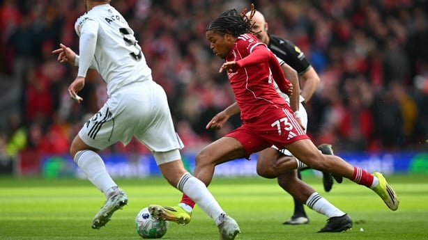  Rio Ngumoha runs with the ball during the English Premier League football match between Liverpool and Fulham at Anfield in Liverpool, north west England on April 11, 2026. 