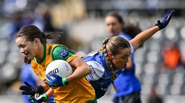 Katie Dowds of Donegal in action against Christina Charters of Cavan during the Lidl Ladies National Football League Division 2 final match between Cavan and Donegal at St Tiernach's Park in Clones, Monaghan.