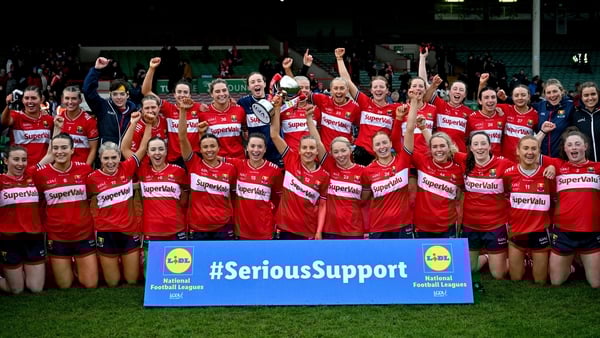 11 April 2026; Cork players and coaching staff celebrate with the cup after their side's victory in the Lidl Ladies National Football League Division 1 final match between Cork and Galway at TUS Gaelic Grounds, Limerick. Photo by Sam Barnes/Sportsfile