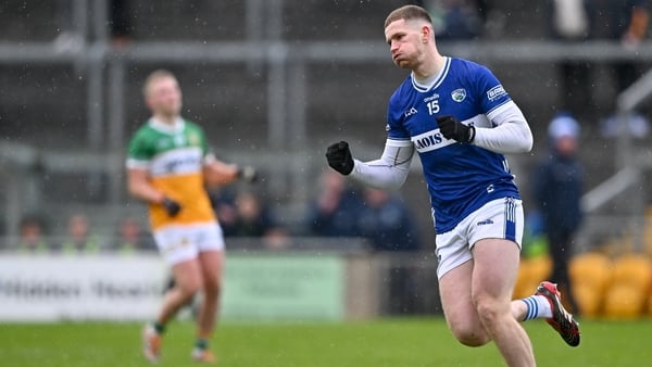 Laois forward Evan O'Carroll reacts after scoring a point against Offaly