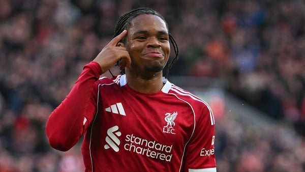 Liverpool's English striker #73 Rio Ngumoha celebrates after scoring the opening goal of the English Premier League football match between Liverpool and Fulham at Anfield in Liverpool, north west England on April 11, 2026.