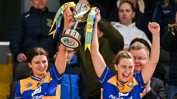 Clare joint-captains Abby Walsh, left, and Clare Hehir lift the cup after their side's victory in the Centra National Camogie League Division 1B final match between Clare and Dublin at UPMC Nowlan Park in Kilkenny.