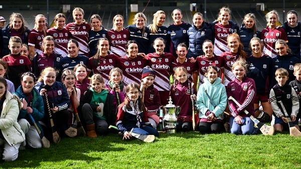 Galway players and supporters celebrate with the cup after victory in the Centra National Camogie League Division 1A final match between Waterford and Galway at UPMC Nowlan Park in Kilkenny.