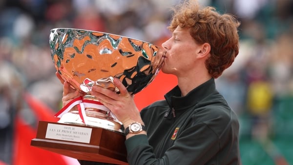 MONTE-CARLO, MONACO - APRIL 12: Jannik Sinner of Italy kisses his winners trophy after victory against Carlos Alcaraz of Spain during the Men's Singles Final during day eight of the Rolex Monte-Carlo Masters at Monte-Carlo Country Club on April 12, 2026 i