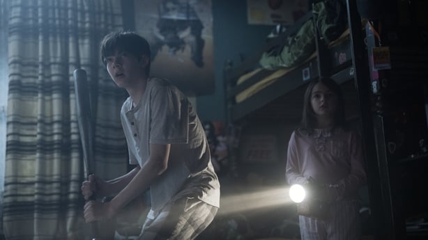 (L-R) Shylo Molina as Sebastián Cannon and Billie Roy as Maud Cannon are ready for a fight in Lee Cronin's The Mummy