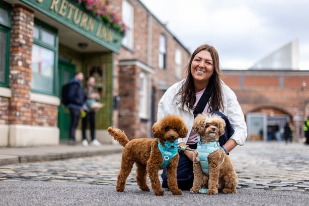 Annie Palmas with her dogs Joey and Jessie, on the Coronation Street cobbles in Manchester. Photo: James Speakman/PA Media Assignments