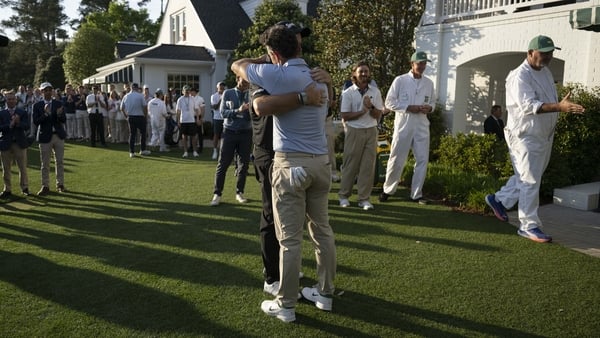 Masters champion Rory McIlroy of Northern Ireland celebrates with Shane Lowry of Ireland after winning back-to-back Masters at Augusta National Golf Club, Sunday, April 12, 2026. (Photo by Joel Marklund/Augusta National/Getty Images)