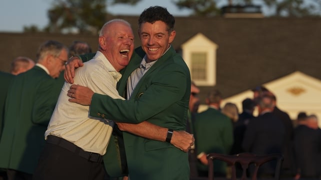 Rory McIlroy celebrates with his father Gerry during the Green Jacket Ceremony